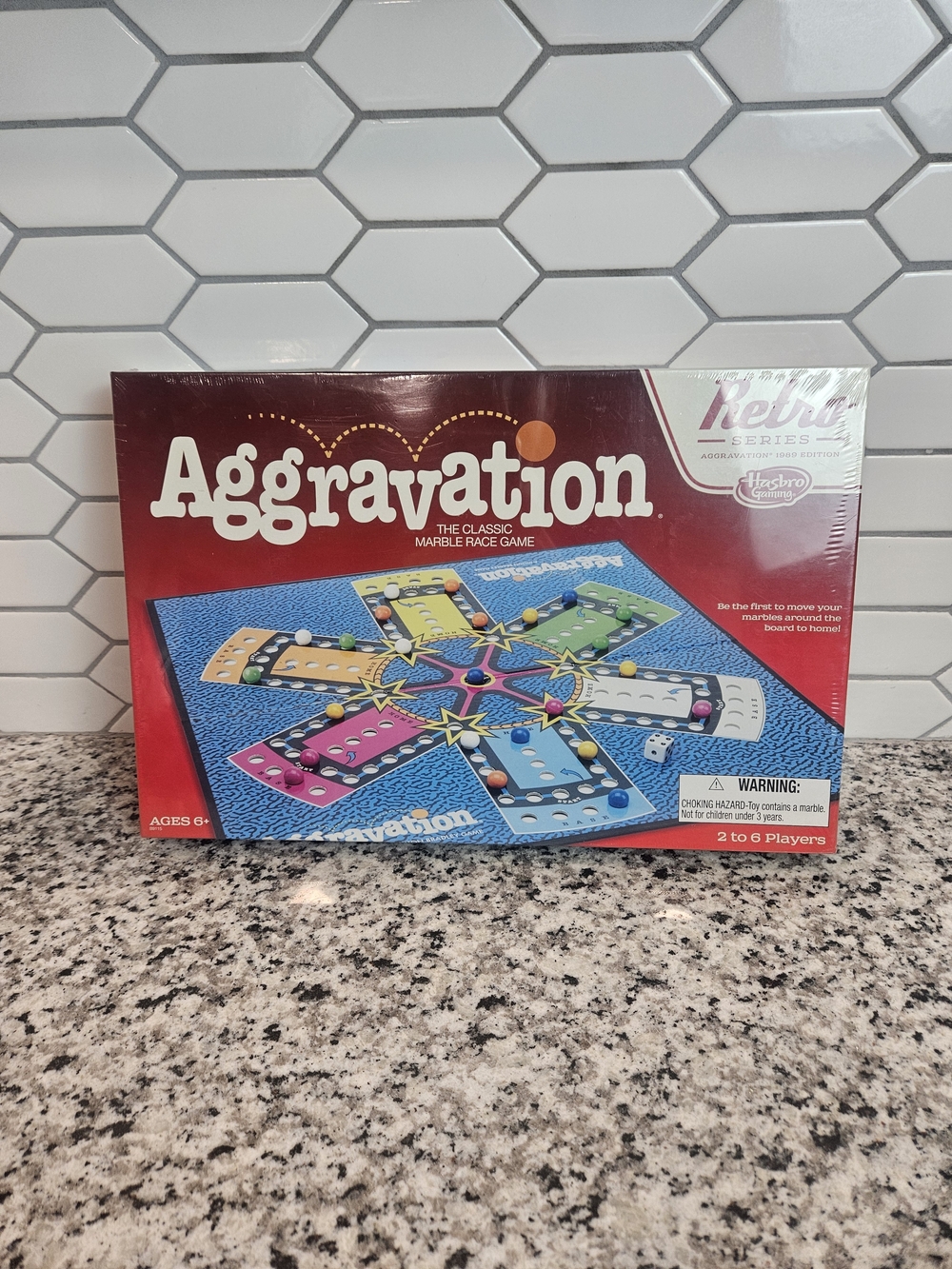 Hasbro Aggravation Board Game - Red Box with Multicolor Board